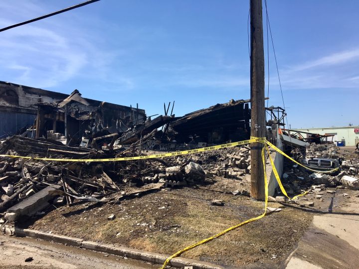 Two days after a massive blaze sent three firefighters to hospital and destroyed part of a building housing several businesses, the owners of one of the affected businesses is thanking fire crews for their bravery.