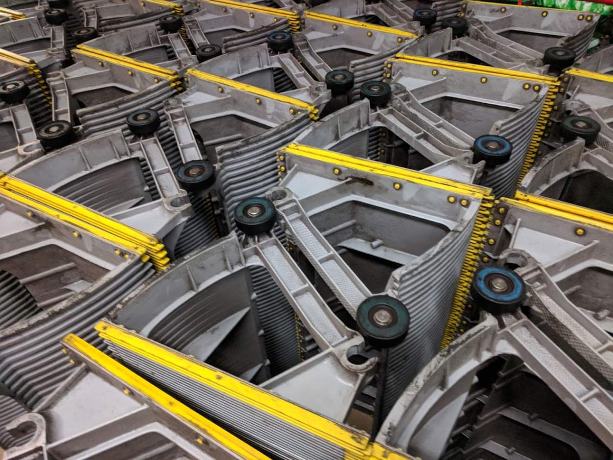 Escalator steps seen stacked to the side during proactive maintenance at Granville Station.