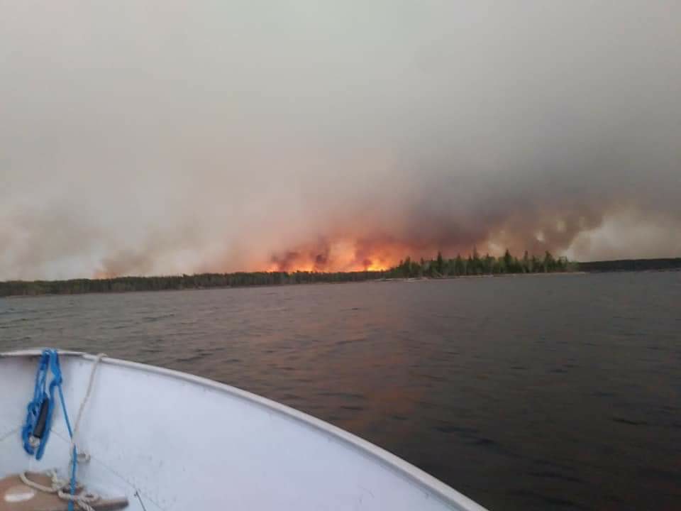 The community of Little Grand Rapids have been forced to leave their homes because of a growing wildfire.