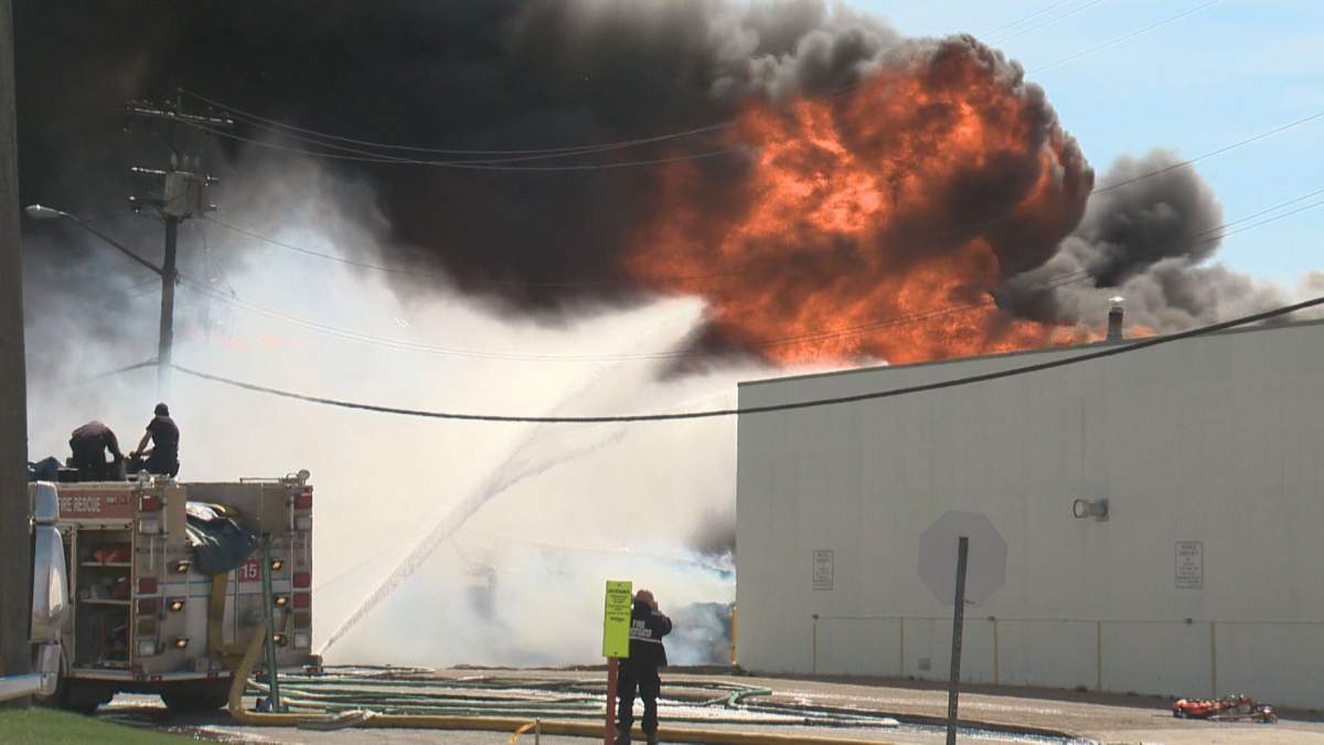 Firefighters battle a fire near 83 St & Wagner Rd Saturday.