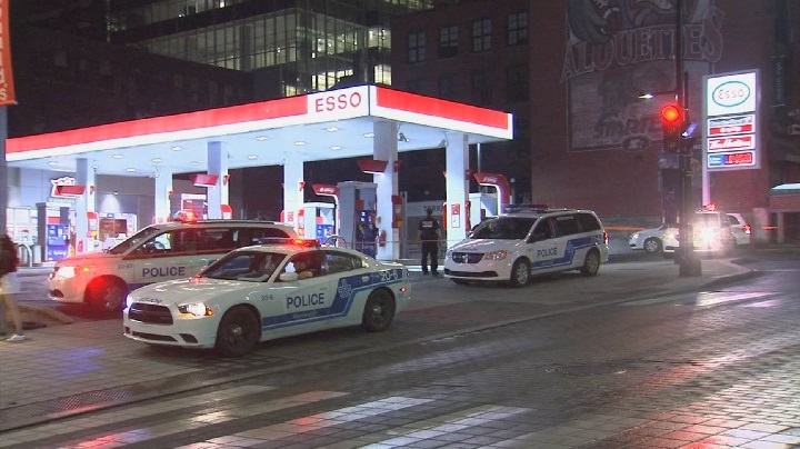 Police investigate after four men injured in gas station parking lot in Montreal's Ville-Marie borough. Saturday, May 26, 2018.