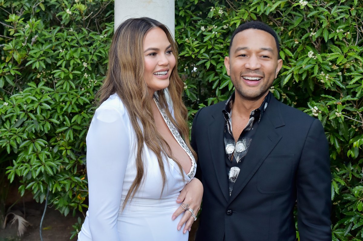 Chrissy Teigen (L) and John Legend attend The Daily Front Row's 4th Annual Fashion Los Angeles Awards at Beverly Hills Hotel on April 8, 2018 in Beverly Hills, California.