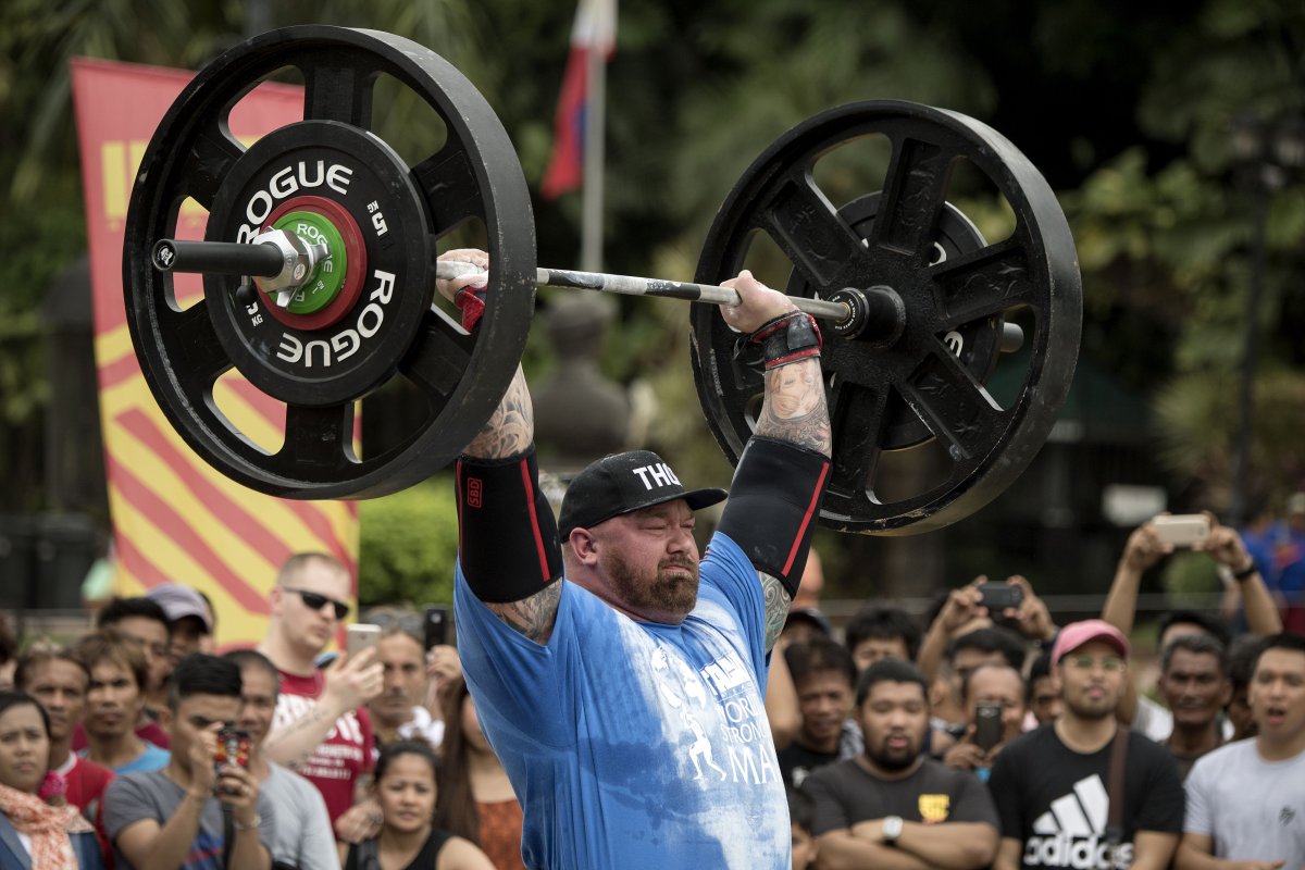 Hafthor Julius Bjornsson of Iceland lifts weights during the Max Overhead competition of the 2018 Worlds Strongest Man in Manila on May 5, 2018. 