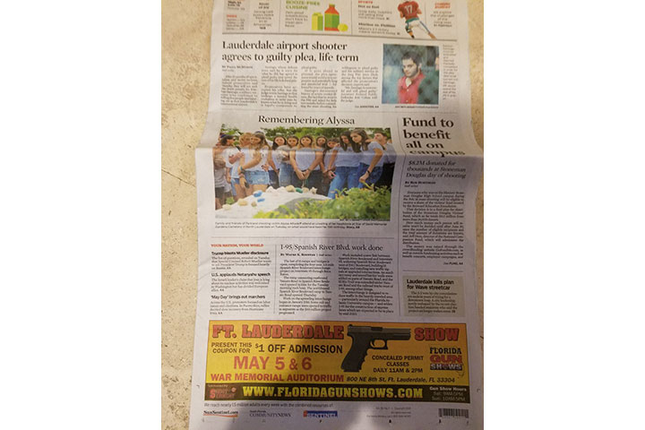 The father of one of the students killed during the Parkland, Fla., school shooting tweeted a picture of the Sun Sentinel newspaper showing an advertisement for guns under stories about gun violence.