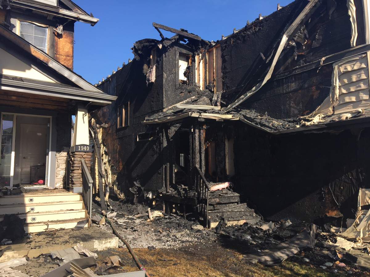 Two homes near 1940 – 67 St. SW in Edmonton’s Summerside neighbourhood were heavily damaged by fire early Monday morning. May 14, 2018.