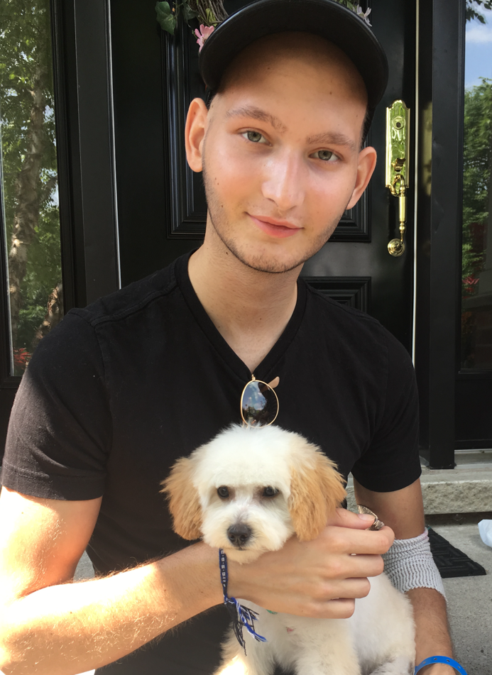 Alec Martel says his miniature poodle mix is always there for him.