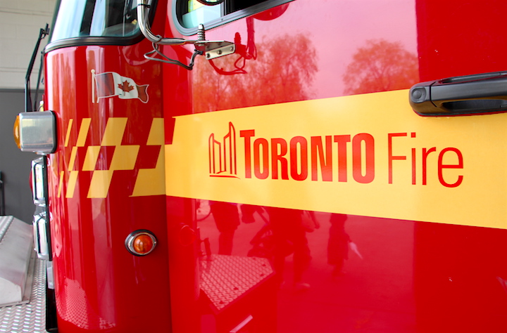 A Toronto Fire Services truck on display at a downtown station.