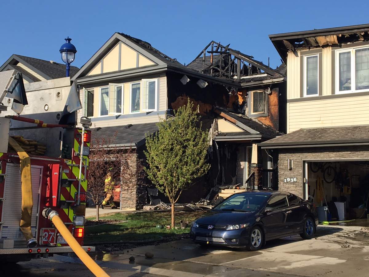 Two homes near 1940 – 67 St. SW in Edmonton’s Summerside neighbourhood were heavily damaged by fire early Monday morning. May 14, 2018.