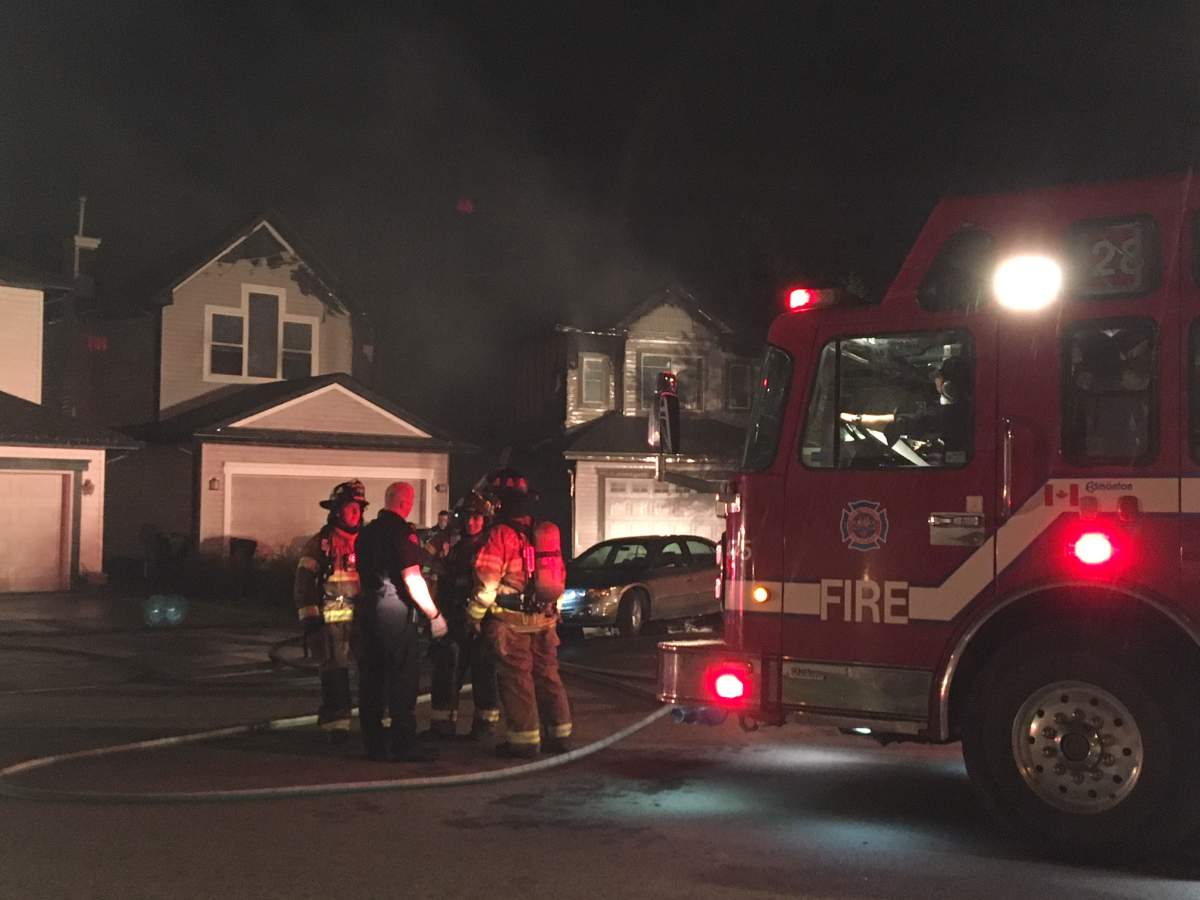 Two homes on Melrose Crescent in the southwest Edmonton neighbourhood of MacEwan were heavily damaged by fire early Wednesday morning. May 30, 2018.