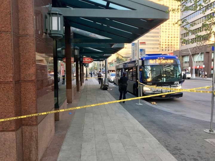 Edmonton police taped off part of a sidewalk on Jasper Avenue near 102 Street as they investigated an assault with a weapon on Friday night.