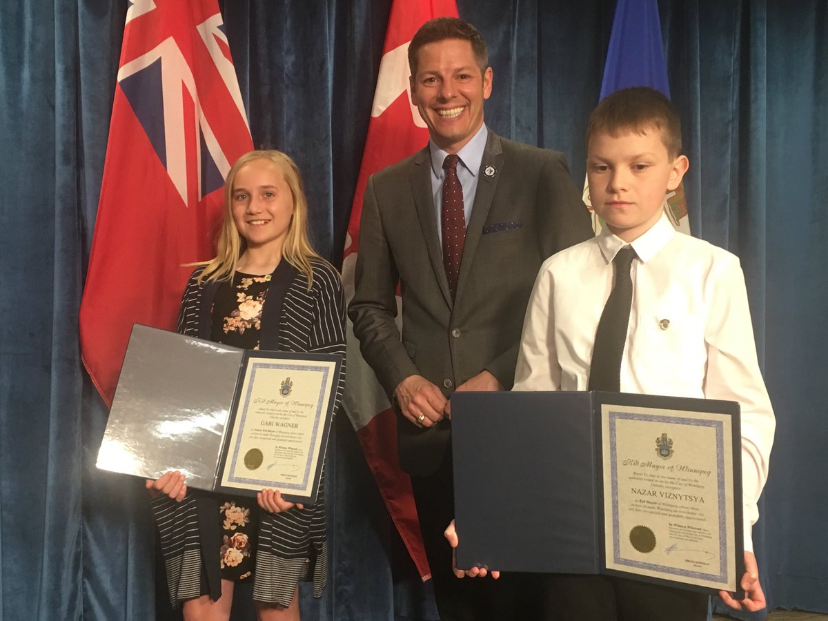 Mayor Brian Bowman with 2018's Kid Mayor and Deputy Kid Mayor.