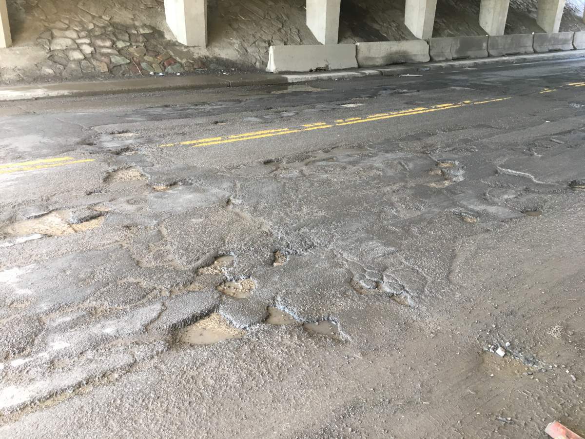 Lachine pot holes on 43e Avenue, under Côte-de-Liesse overpass.