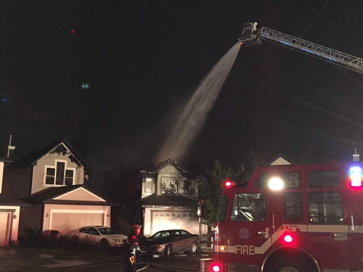 Two homes on Melrose Crescent in the southwest Edmonton neighbourhood of MacEwan were heavily damaged by fire early Wednesday morning. May 30, 2018.