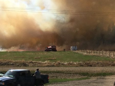 Wind and dry temperatures cause problems for fire crews battling ...