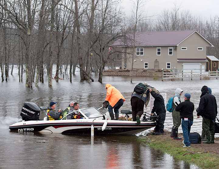 These photos show the extent of the floods engulfing New Brunswick