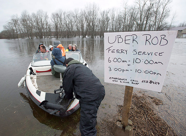 These photos show the extent of the floods engulfing New Brunswick