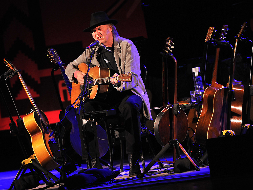 Neil Young performs at Massey Hall on January 12, 2014 in Toronto.