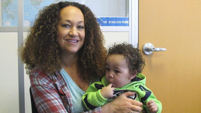 In this March 20, 2017, file photo, Rachel Dolezal poses for a photo with her son, Langston, at the bureau of The Associated Press in Spokane, Wash. 