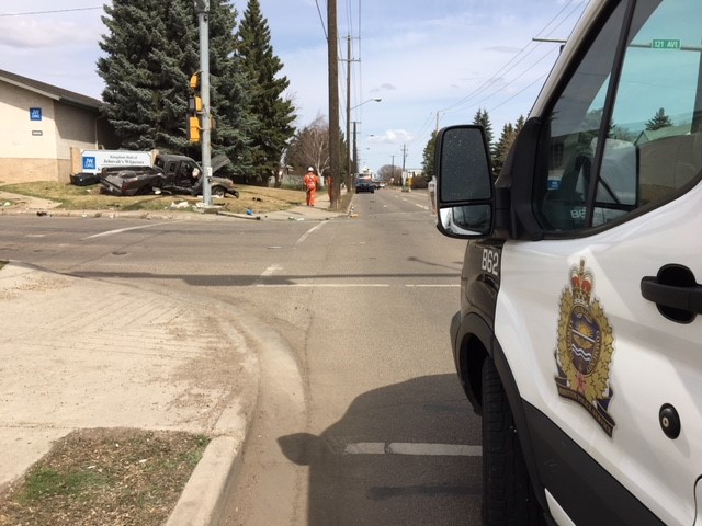 A white Pontiac Grand Prix car collided with a black Ford Ranger truck in the intersection of 50 Street and 121 Avenue in north Edmonton Thursday morning. May 3, 2018.