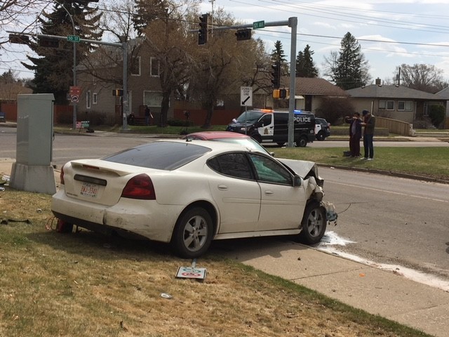 A white Pontiac Grand Prix car collided with a black Ford Ranger truck in the intersection of 50 Street and 121 Avenue in north Edmonton Thursday morning. May 3, 2018.
