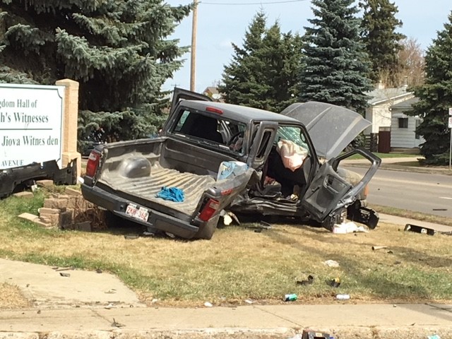 A white Pontiac Grand Prix car collided with a black Ford Ranger truck in the intersection of 50 Street and 121 Avenue in north Edmonton Thursday morning. May 3, 2018.