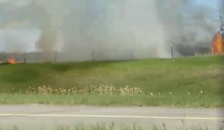 Photo of a grass fire burning in northeast Edmonton on May 23, 2018.