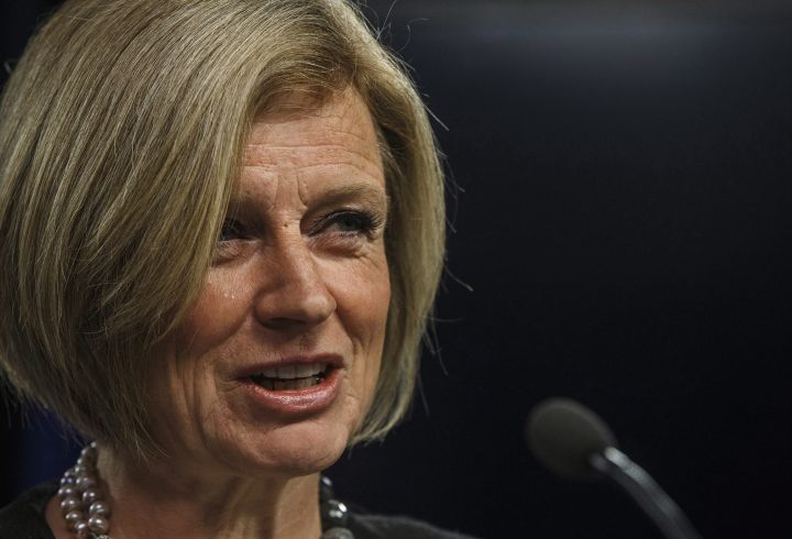 Alberta Premier Rachel Notley unveils an ad they will be running in B.C. about the pipeline expansion in Edmonton, Alta., on Thursday, May 10, 2018. 