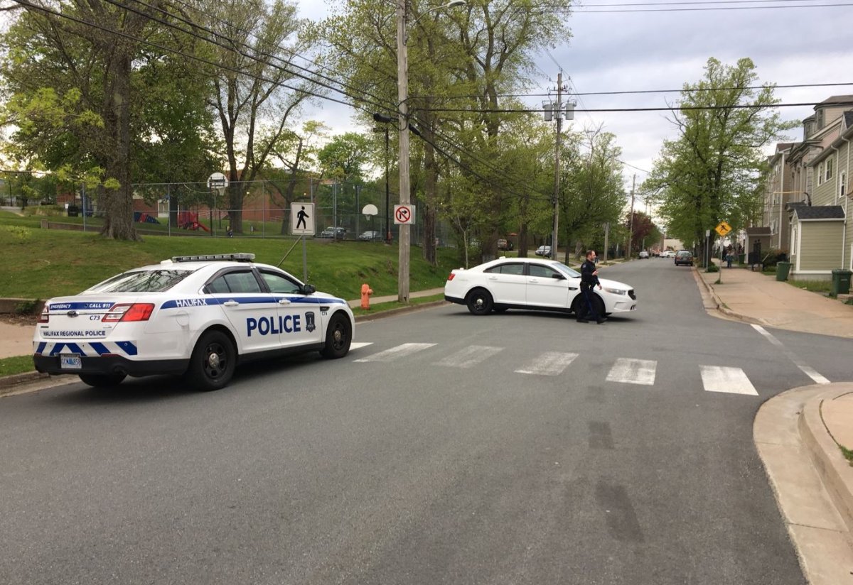 Halifax Regional Police block off a section of Brunswick Street after receiving a report of shots fired on Wednesday, May 23, 2018. 