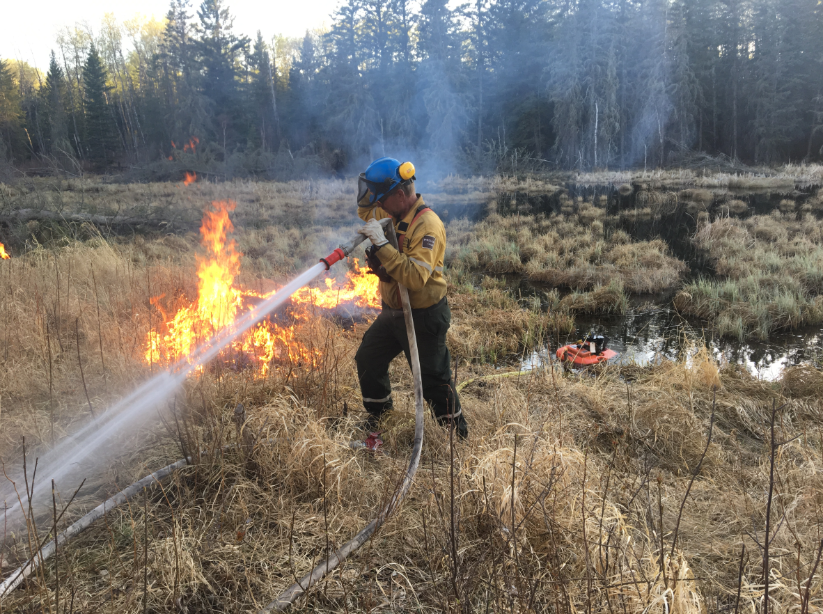 Although conditions remain dry, overcast skies are assisting crews significantly in helping to bring the wildfires under control.