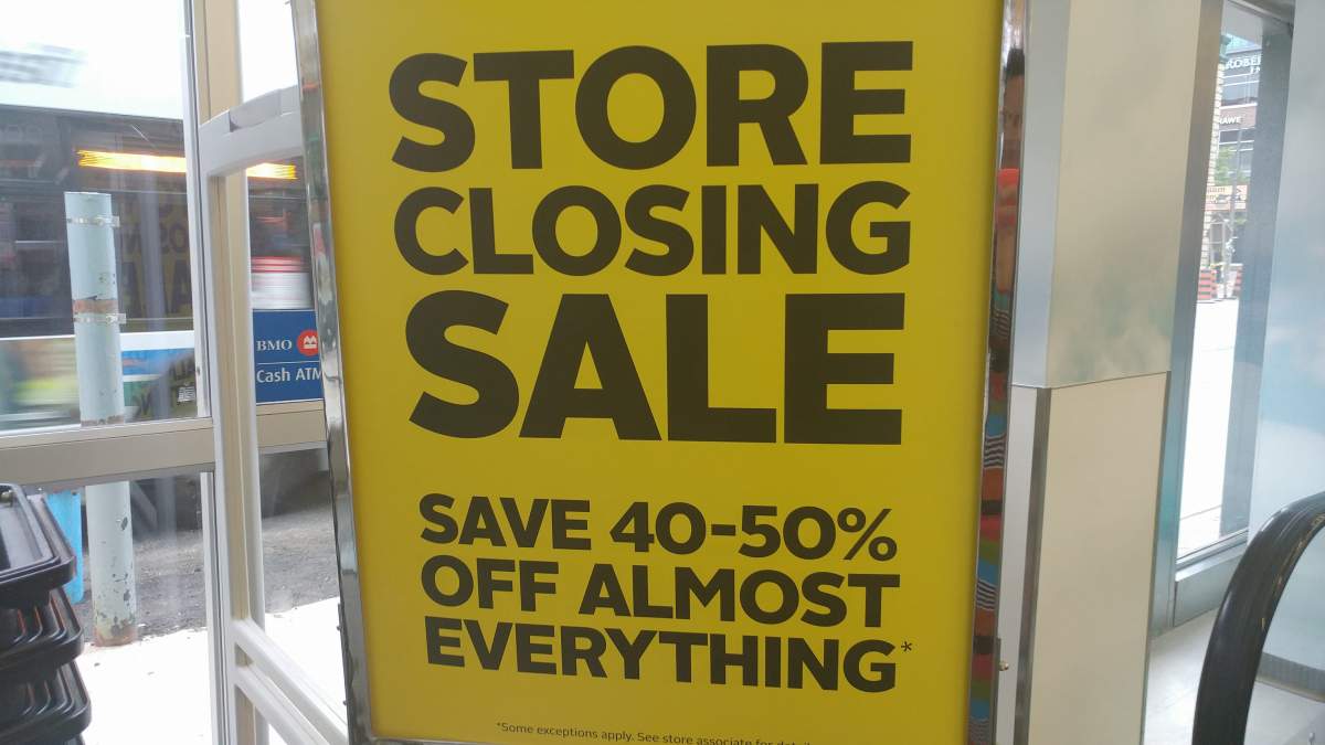 Bright yellow signs throughout the downtown location boast