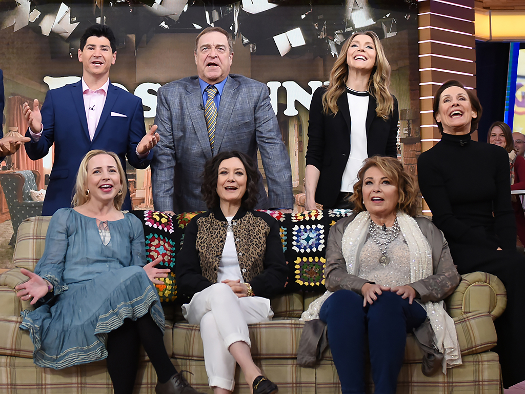 The cast of 'Roseanne' smiles for a promo photo on 'Good Morning America' on March 26, 2018.