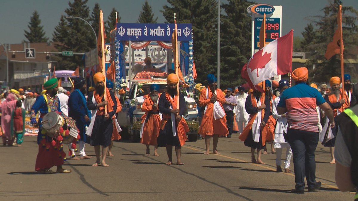 Thousands of people joined a parade made up of vibrant colours and music as it weaved its way through Edmonton's Mill Woods community Sunday.