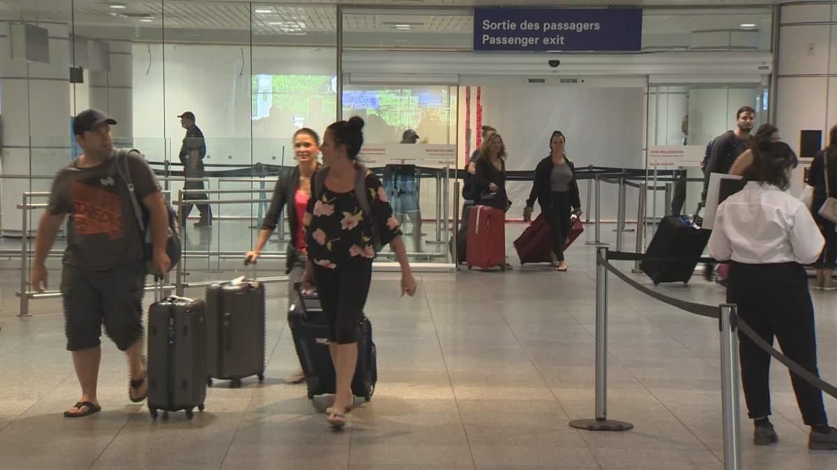 Cuabana airlines passengers returning from Cuba after being stranded for five days. Wednesday May 23, 2018.  