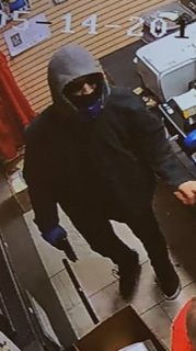Surveillance photo of one suspect. (Cobourg Police photo)