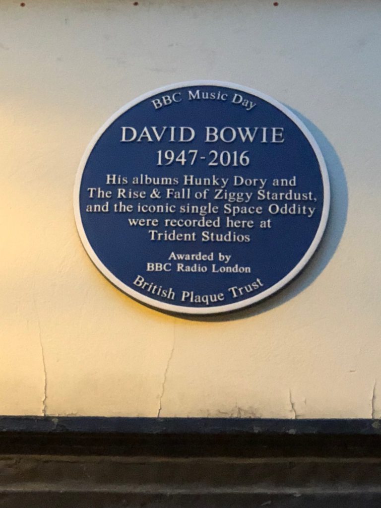 This is above the door of Trident Studios, a place where David Bowie recorded some of his most famous songs.