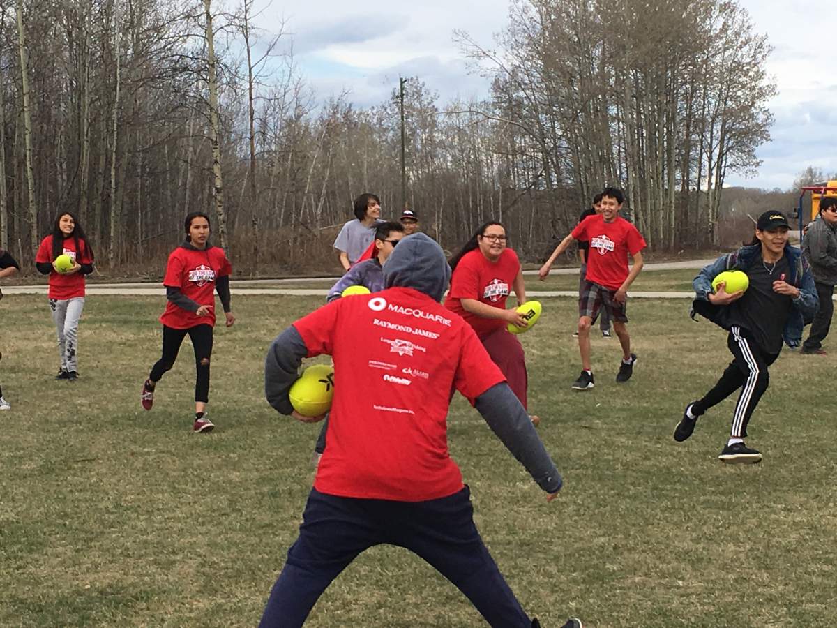 Canadian rugby community introduces sport to students at Tsuut’ina Junior Senior High School near Calgary - image