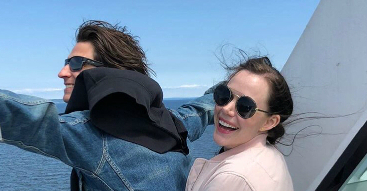 Scott Moir, right, and Tessa Virtue act out a famous scene from "Titanic.".