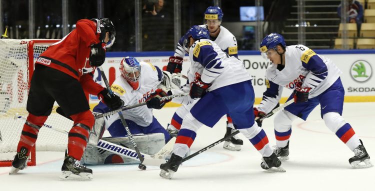 Canada's Ryan Nugent-Hopkins, left, scores his sides first goal past South Korea's Matt Dalton, 2nd left, during the Ice Hockey World Championships.