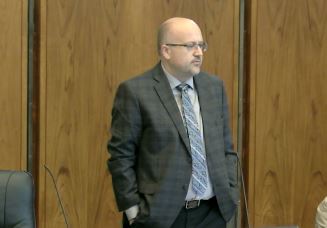 Councillor Russ Wyatt speaks to his council colleagues after returning from a leave of absence.