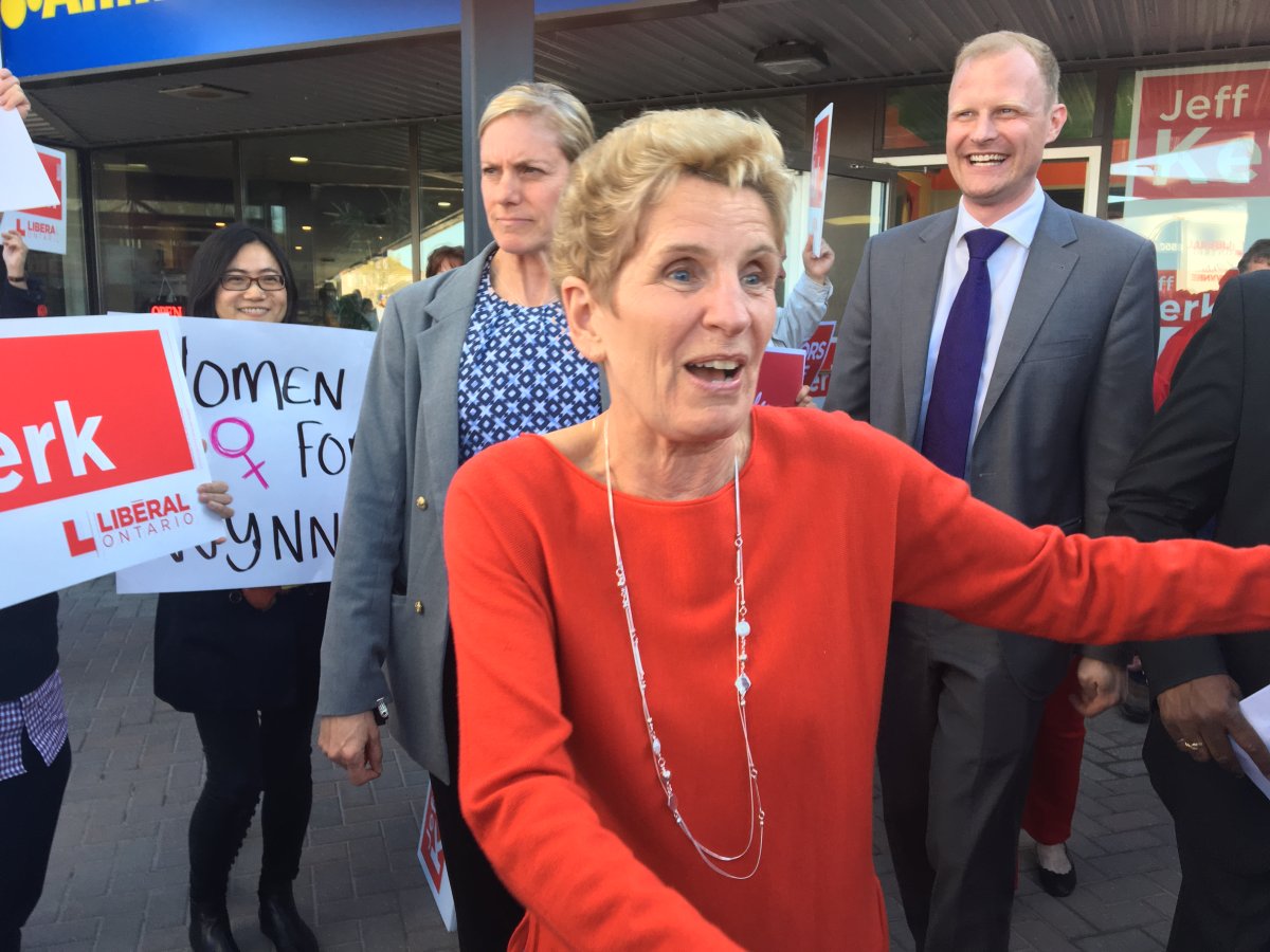 Kathleen Wynne greets supporters outside of a campaign event in Barrie.