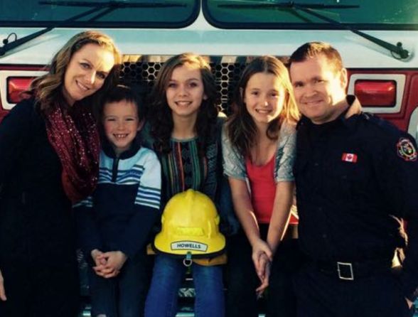 Jay Howells with his wife and three children, including Jack who was unexpectedly born on their bathroom floor in Morinville.