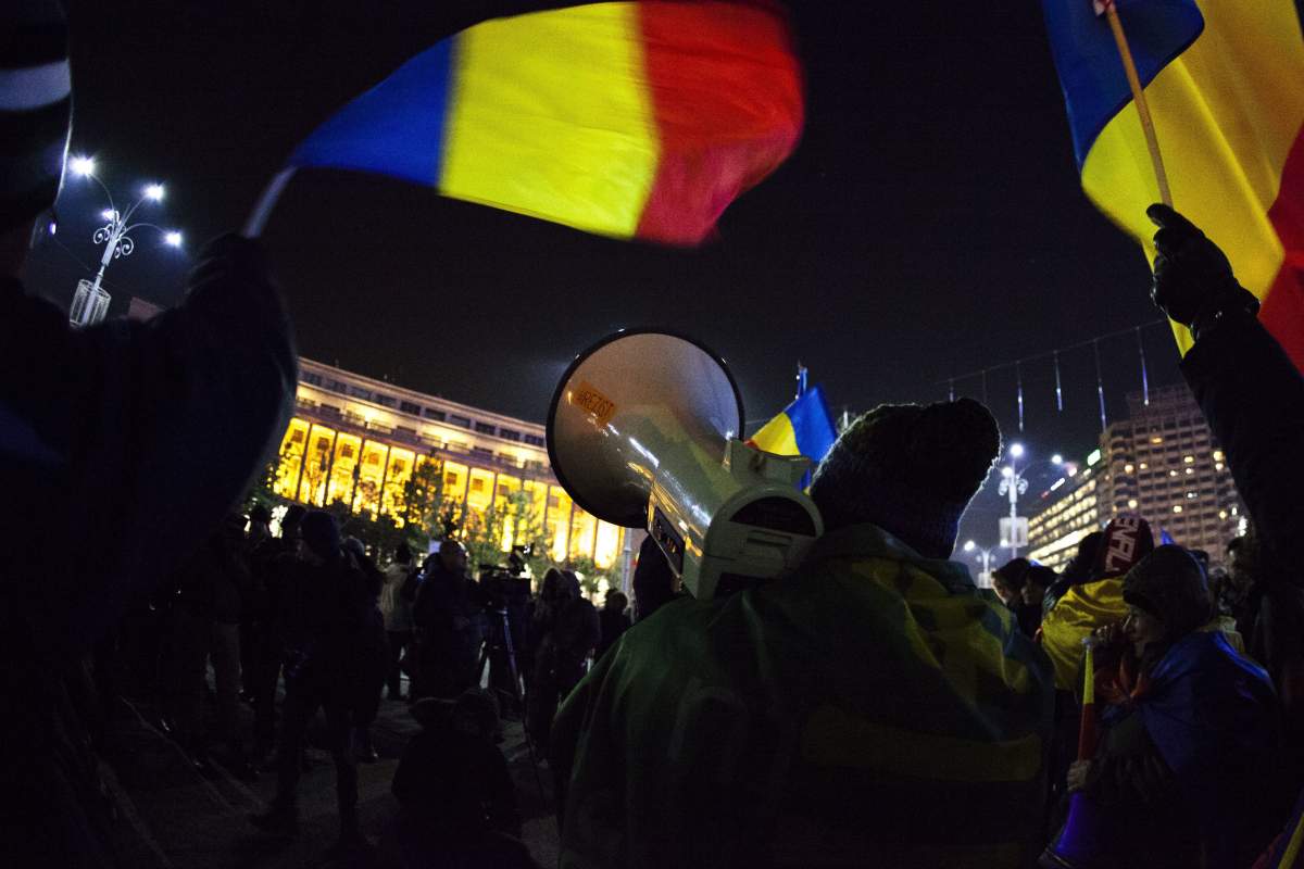 Protesters rally in Bucharest on January 24, 2018 against the planned changes to judiciary laws. The European Union's executive body on January 24 warned the Romanian government that its controversial judicial reform package would see the country "backtracking" from previous commitments to fight against corruption and organized crime.
