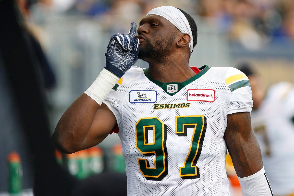 Edmonton Eskimos' Gerald Rivers (97) silences the Winnipeg Blue Bombers fans after they score on a kick return during the first half of pre-season CFL action in Winnipeg Friday, June 1, 2018. 
