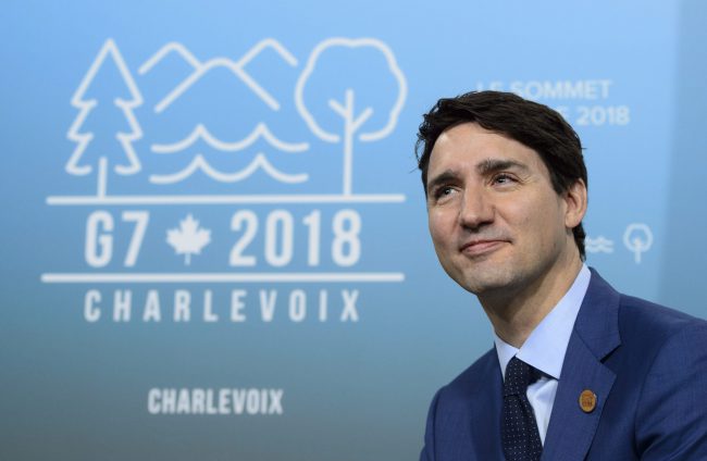 Prime Minister Justin Trudeau takes part in a meeting at the G7 Leaders Summit in La Malbaie, Que., on Friday, June 8, 2018. 