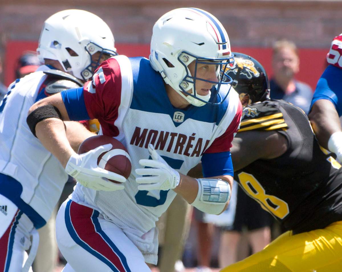 Montreal Alouettes quarterback Drew Willy runs the ball during first half preseason CFL football action against the Hamilton Tiger-Cats in Montreal on Saturday, June 9, 2018.