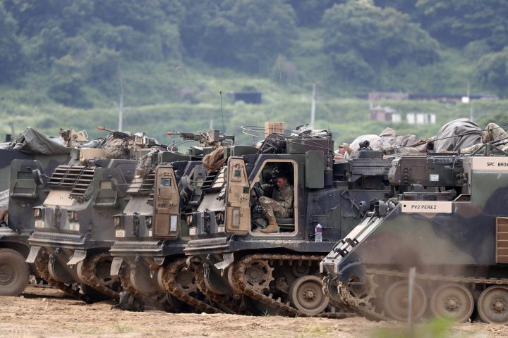 U.S. army personnel and multiple launch rocket systems participate in a defense exercise at the Mugeon-ri drill field near the Demilitarized Zone (DMZ) in Paju, Gyeonggi-do, South Korea.