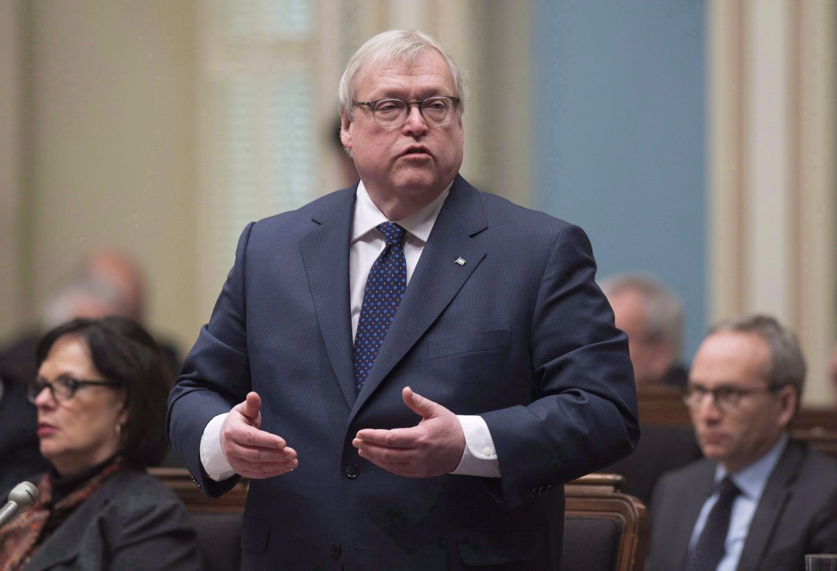 Quebec Health Minister Gaetan Barrette responds to the Opposition during question period in the National Assembly, in Quebec City on Wednesday, March 14, 2018. Several prominent native leaders are calling for Quebec's health minister to resign or be demoted in reaction to comments he made that were deemed offensive, regarding people who use the province's air ambulance system.