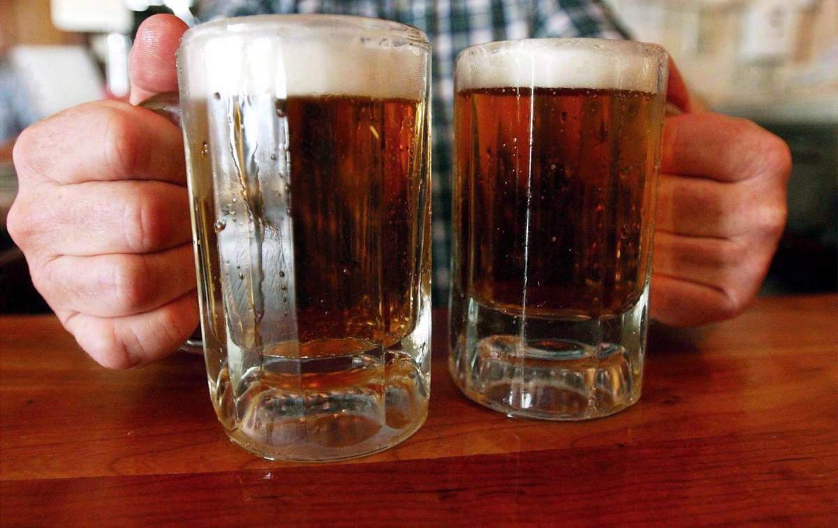 A file photo of two mugs of beer.
