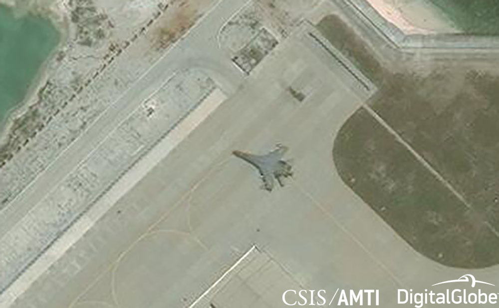 Satellite imagery shows what the CSIS Asia Maritime Transparency Initiative describes as the deployment of several new weapons systems, including a J-11 combat aircraft, at China’s base on Woody Island in the Paracels, South China Sea May 12, 2018.