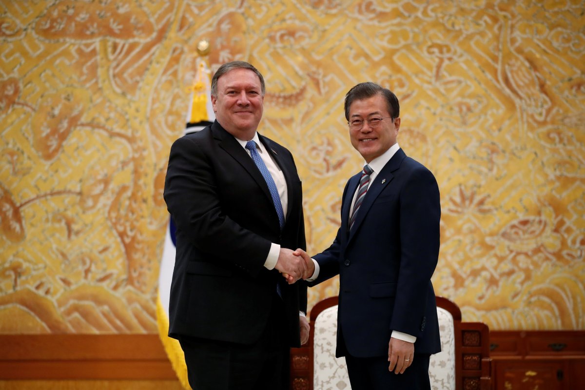 U.S. Secretary of State Mike Pompeo shakes hands with South Korea's President Moon Jae-in during a bilateral meeting at the presidential Blue House in Seoul, South Korea June 14, 2018.